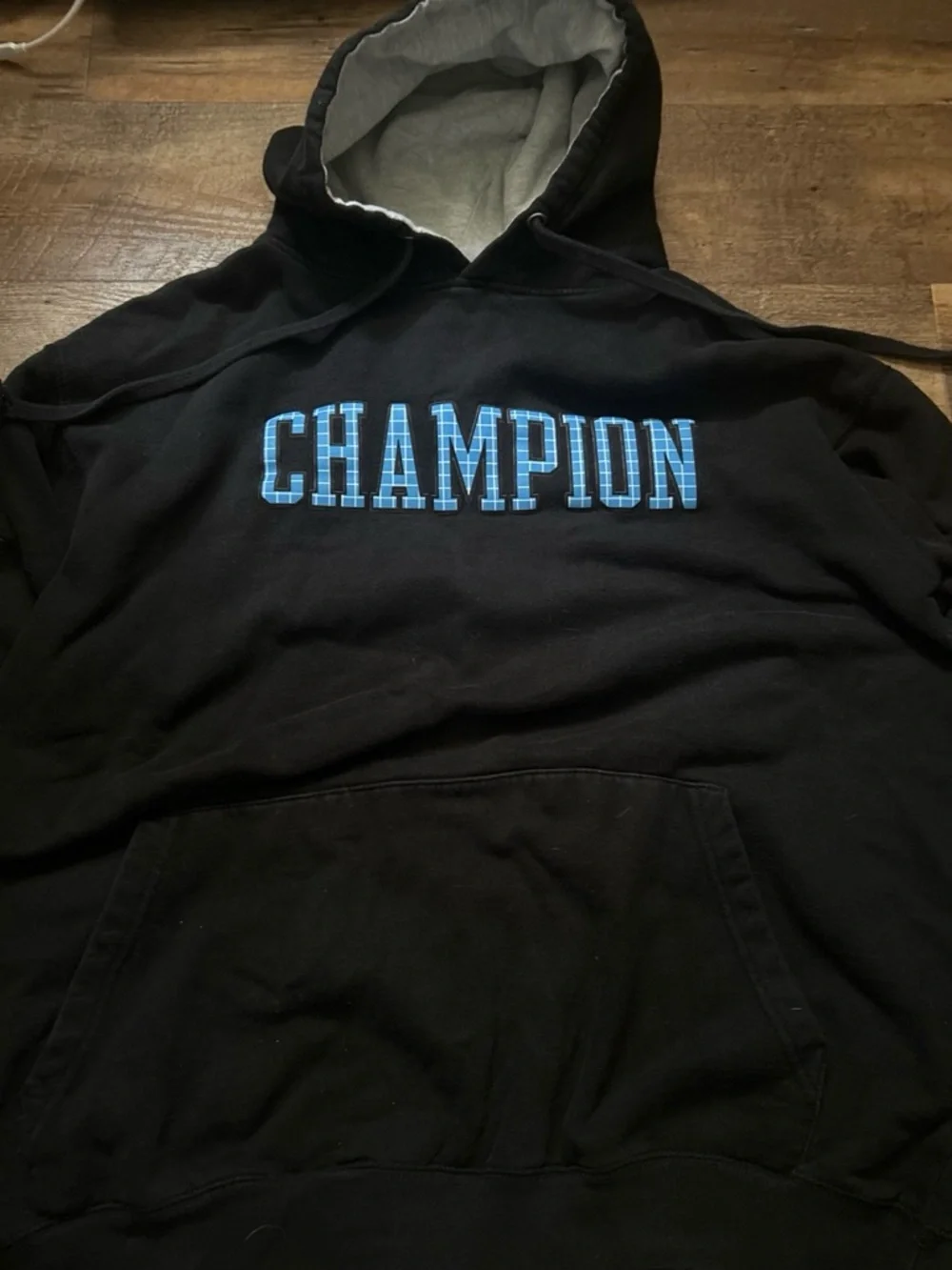 Champion Black Hoodie with Blue Plaid Logo